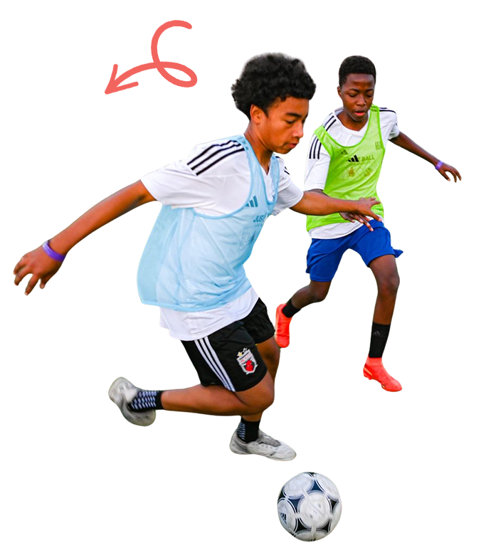 Two children playing with football.